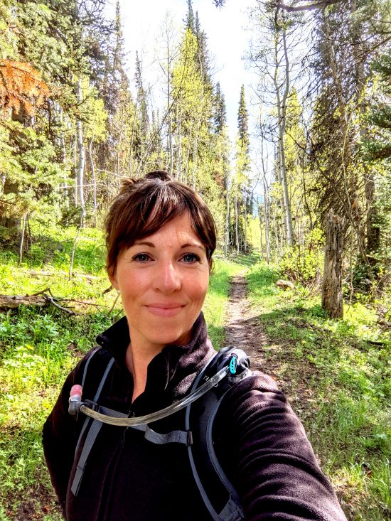 Diane on trail in mountains